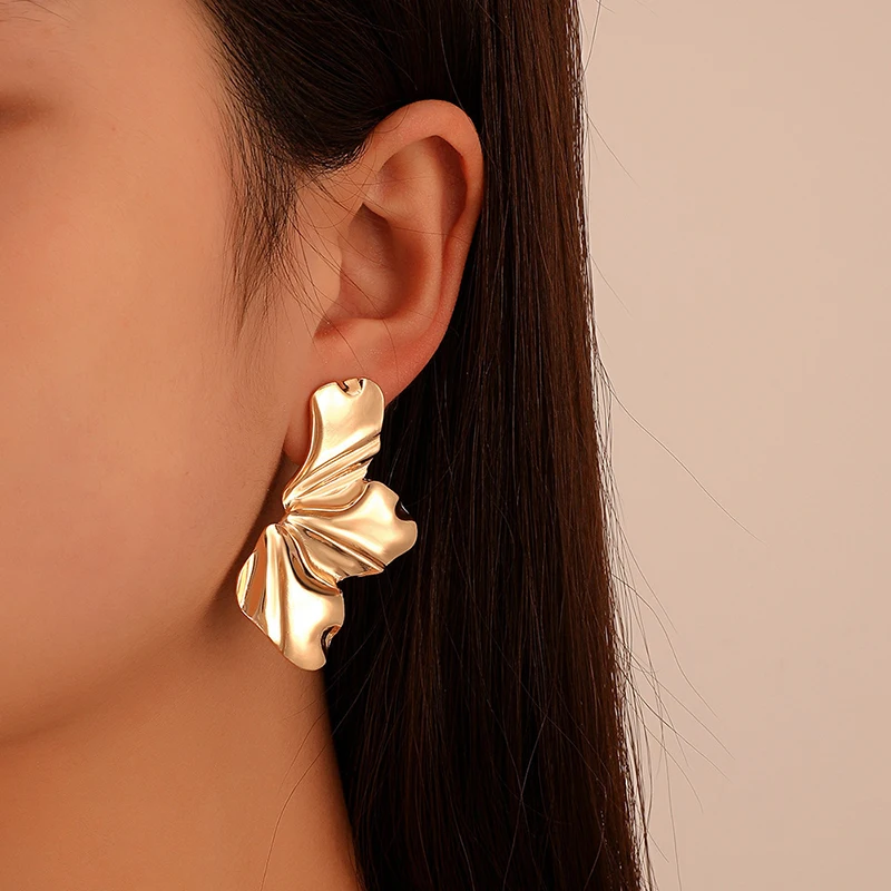 Boucles d'oreilles fleurs moitiés dorées