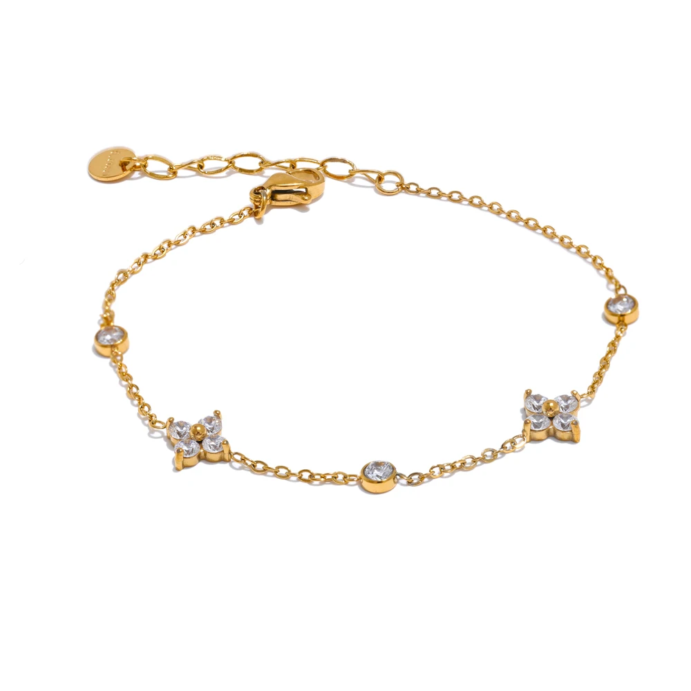 Bracelet à deux fleurs dorées avec cristaux