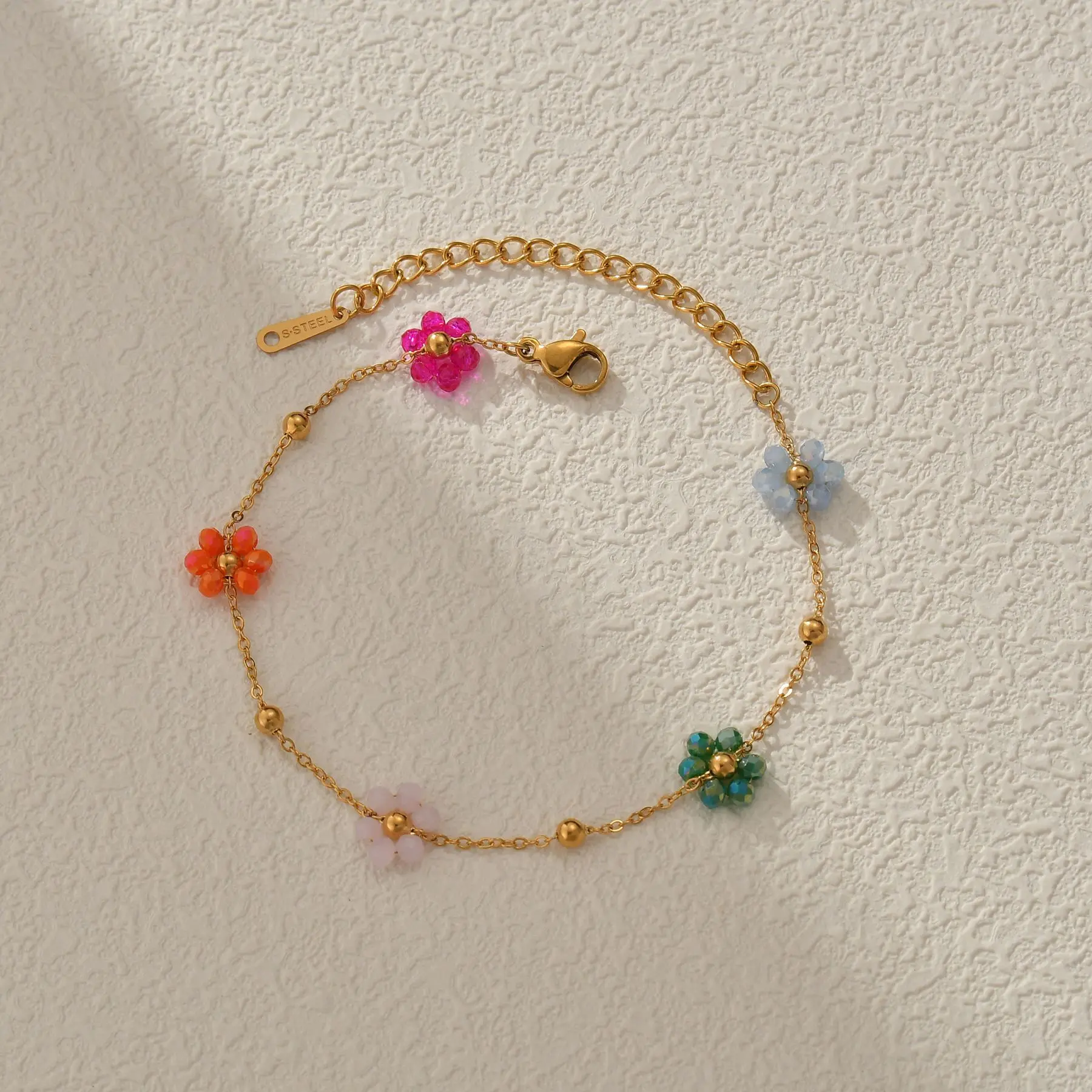 Bracelet avec fleurs multiples multicolores