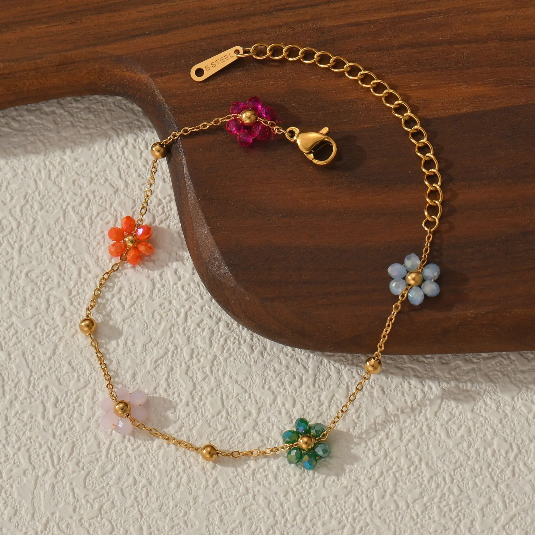 Bracelet avec fleurs multiples multicolores
