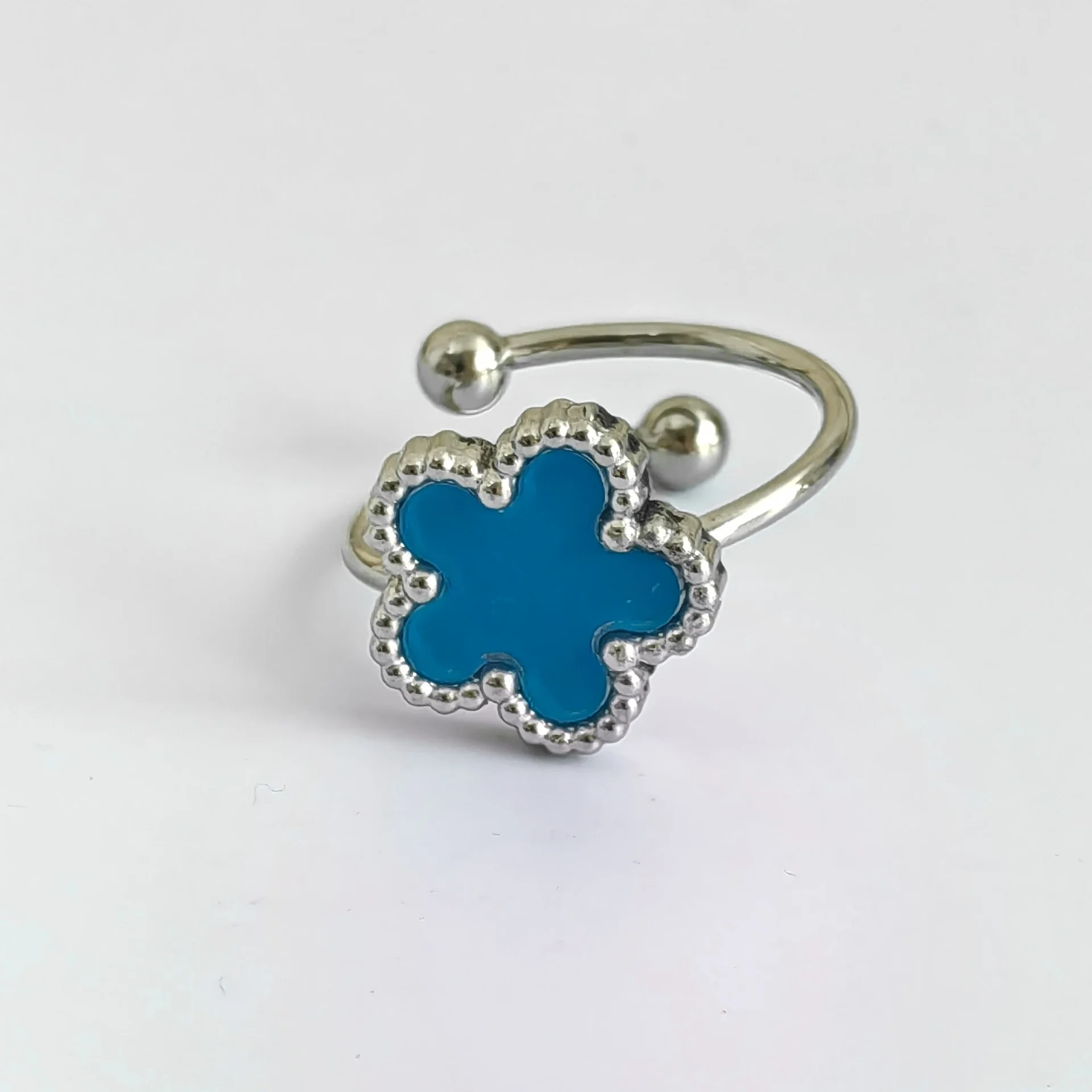 Bague fleur ajustable bleue et argent