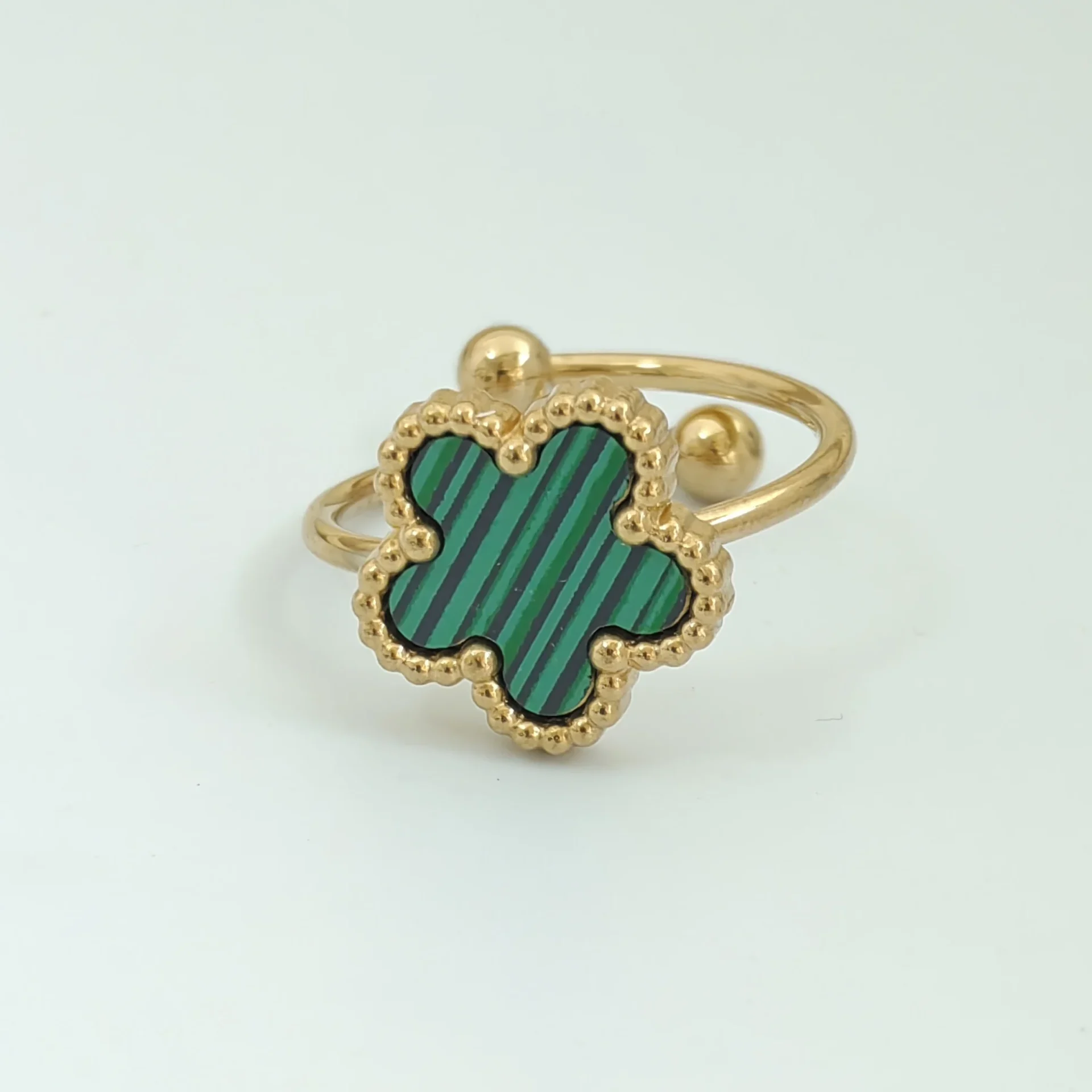 Bague fleur ajustable verte et or