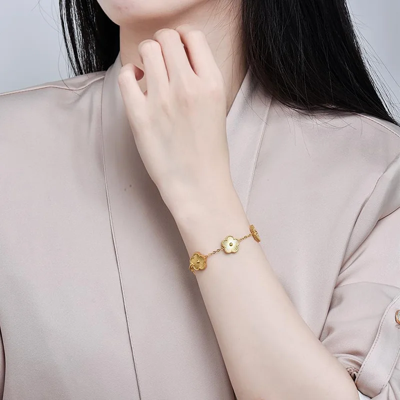 Bracelet fleurs doré multiple
